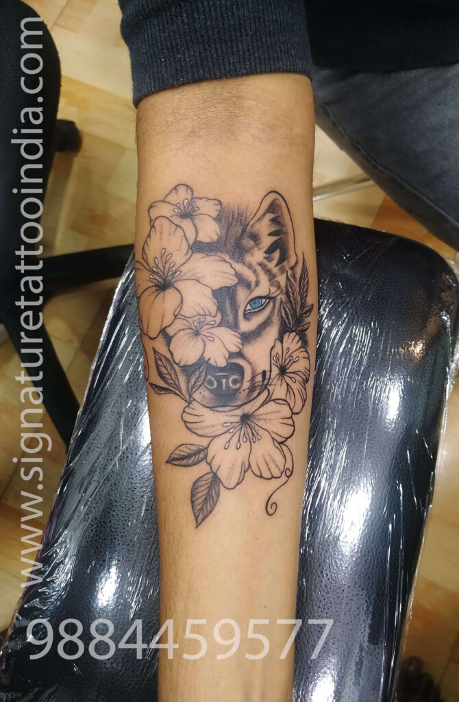 wolf with flower tattoo