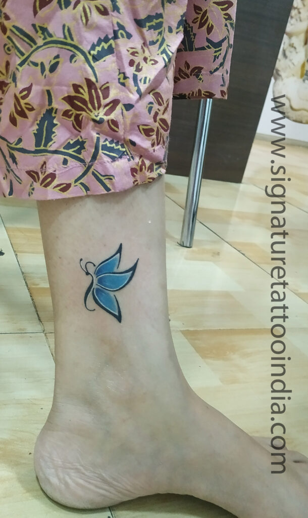 butterfly tattoo on leg